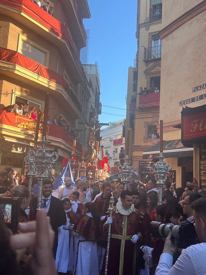 a gallery of pictures showing people in a crowded street as they watch the procession of a brotherhood carrying floats with decorations, flowers and statues
