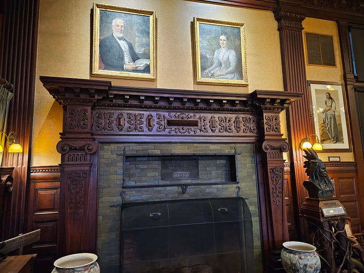 Images of the inside of Mohonk Mountain House, including a colorful Tiffany lamp, an ornate wooden fireplace with 2 portraits above, an antique clock, and a sign that says Afternoon Tea & Cookies.