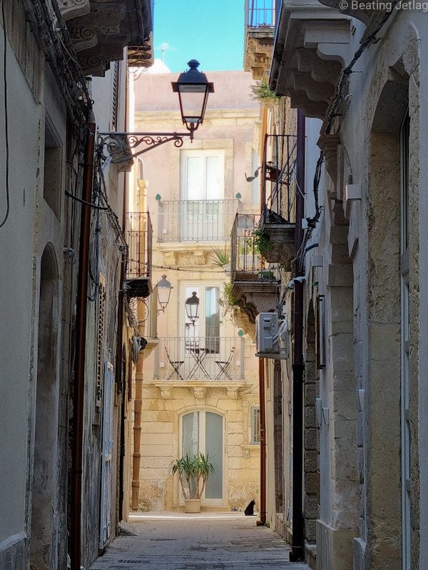 View from the ramparts and one street in Ortigia, Syracuse, italy