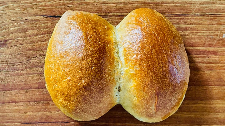 Colonge Rye Rolls and same rolls but as the Cologne Variant of a Halve Hahn with Gouda, Gerkins, Onion and Butter