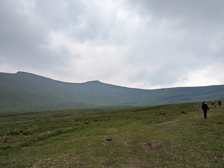 wild swimming on pen y fan in the brecon beacons