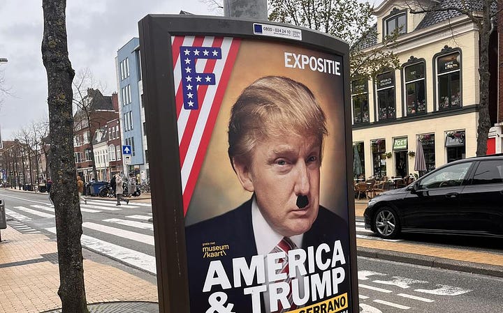 Images depict posters with Donald Trump's face vandalised by a moustache