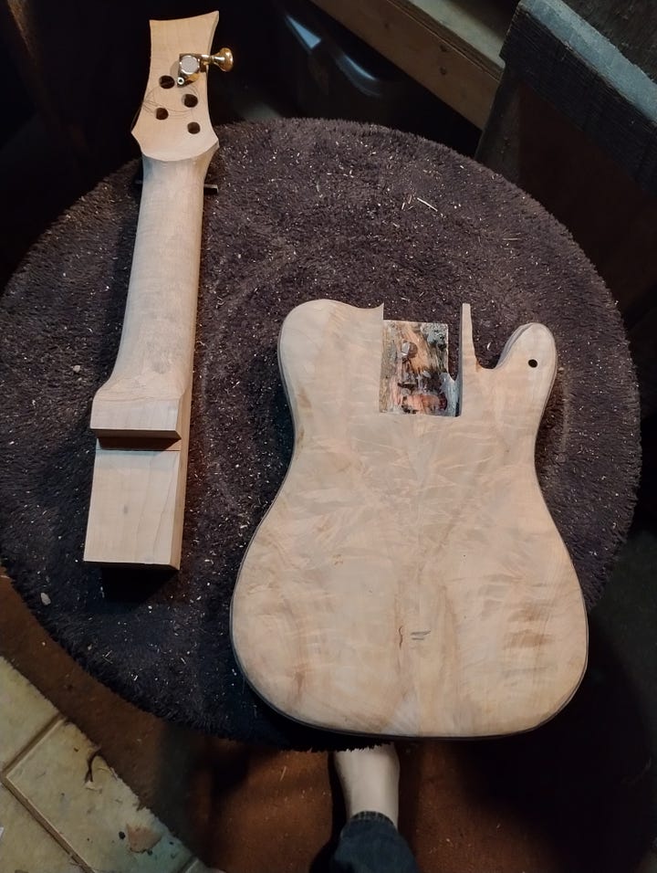 Two shots of a ukele under construction