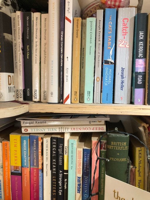 Four photos, each from a different person, showing one or more of my books on their shelves