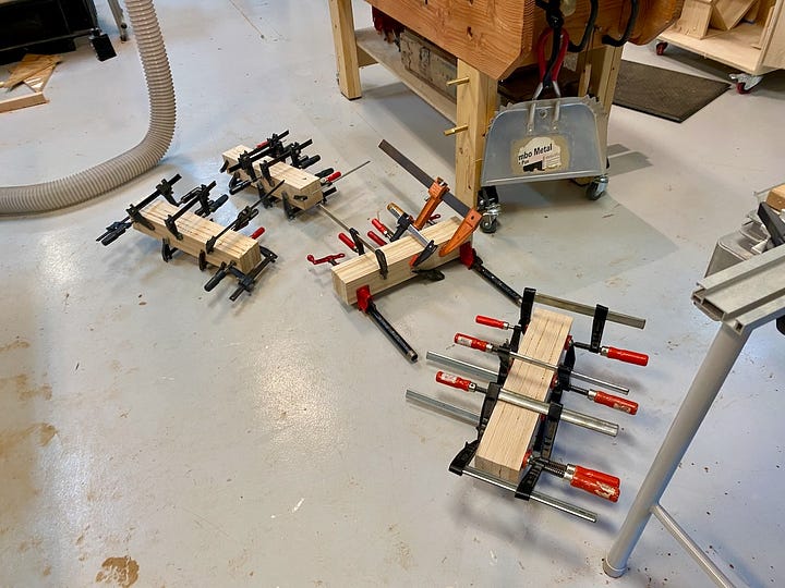 wood in clamps in a workshop