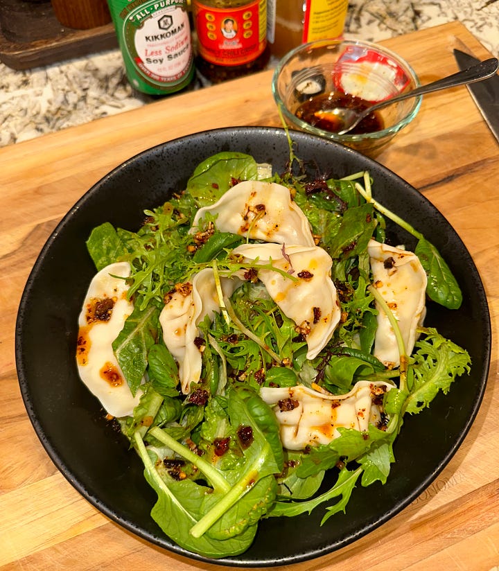 Assembling a dumpling salad