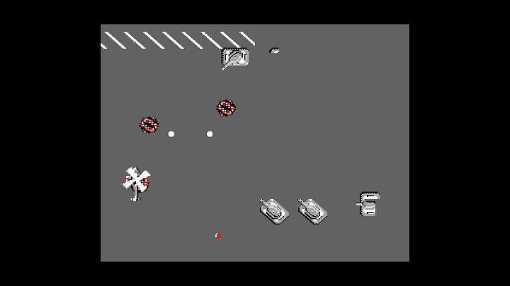 A screenshot from the NES edition of Tiger-Heli that shows an almost featureless gray slate with tanks on it.