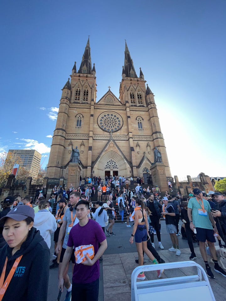 HOKA Runaway Sydney Half Marathon, worshipers and runners in front of St Mary’s Cathedral 