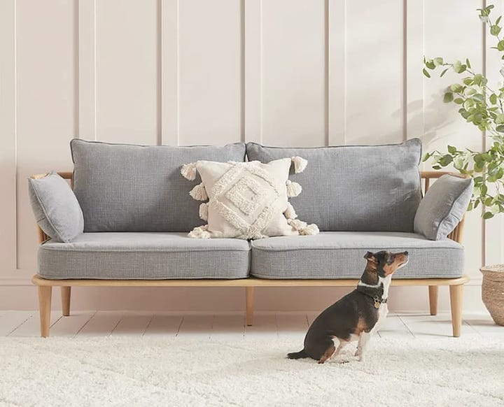 studio couch inspired sofa with grey cushions