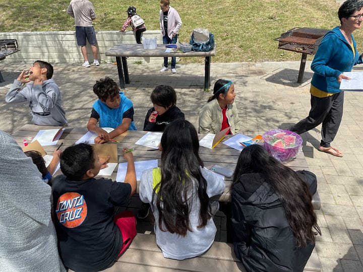 Young people doing poetry activity at Brommer Street Park