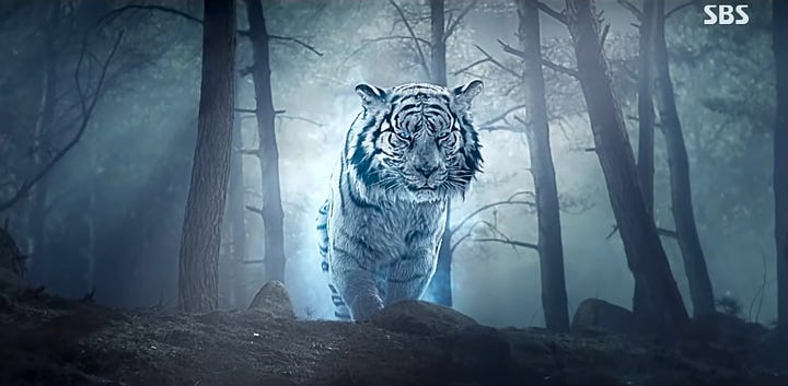 A glowing white tiger in a forest at night; a girl with white hair and blue eyes in a vaguely Korean shaman-ish outfit