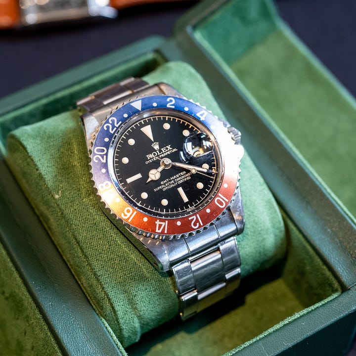 A Rolex GMT-Master 1675 and a gold Rolex 6265. 