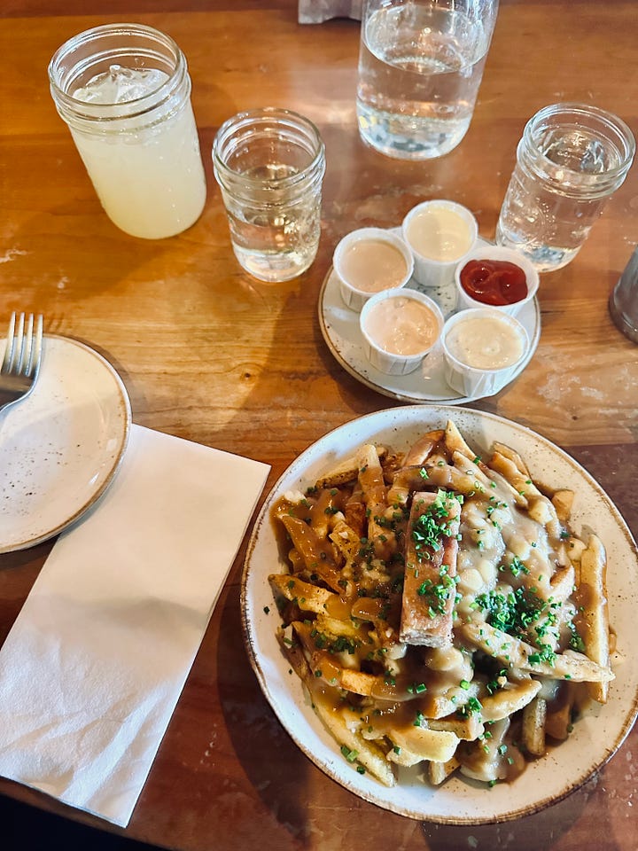 photos of the delicious duckfat poutine (with duck confit) and the duckfat caesar salad.