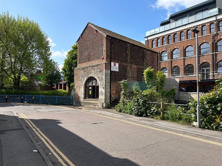 Photos of Handle House a teasel drying house, built to allow teasel heads to dry naturally. In the background on picture one is Studley Mill and in picture 2 a better view of Studley Mill, Trowbridge. Image: Roland's Travels