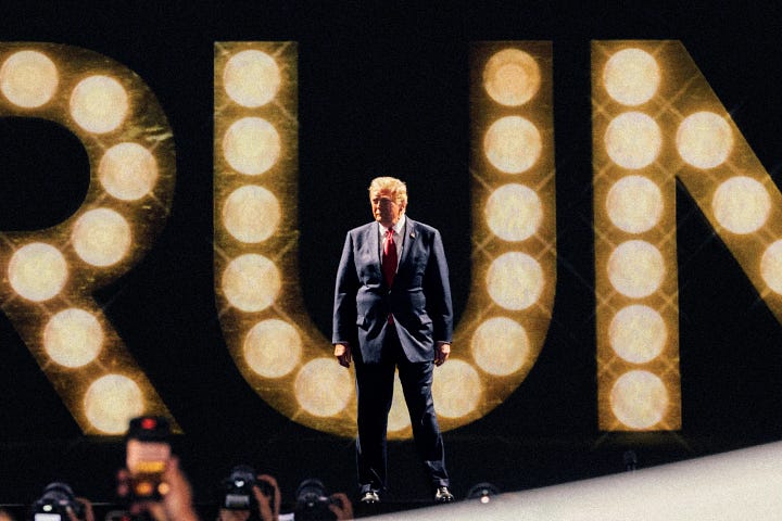 Trump on stage behind his name in lights. Trump embraced the uniform of a firefighter who died during an assassination attempt on Trump’s life at a political rally.