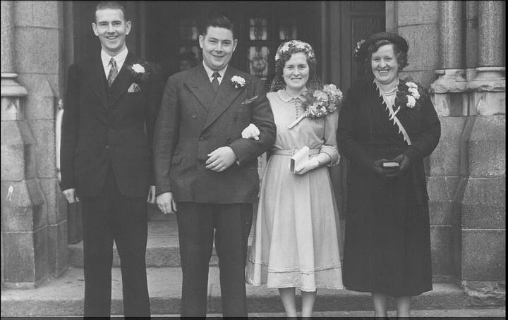 Black and white photo of married couple with Best Man and Bridesmaid, 1950
