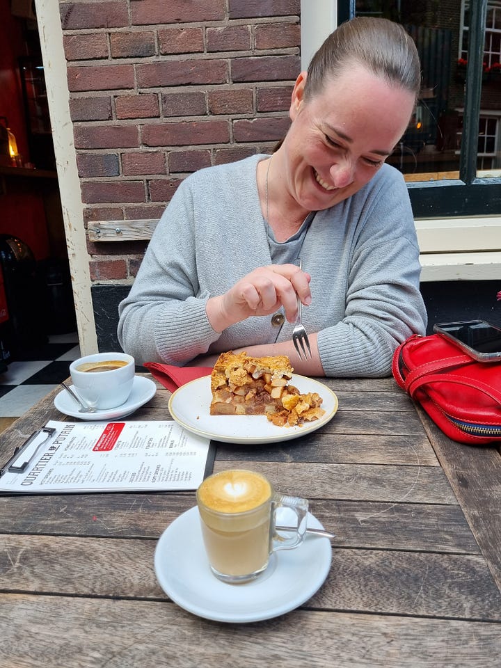 Photo 1: Aisling eating apple pie. Photo 2: Dave eating cheese and crackers. Photo 3: Dave grinning and eating from a red box with the words "cooked with lightning". Photo 4: Aisling grinning, holding a tray of chips covered in truffle mayo. 