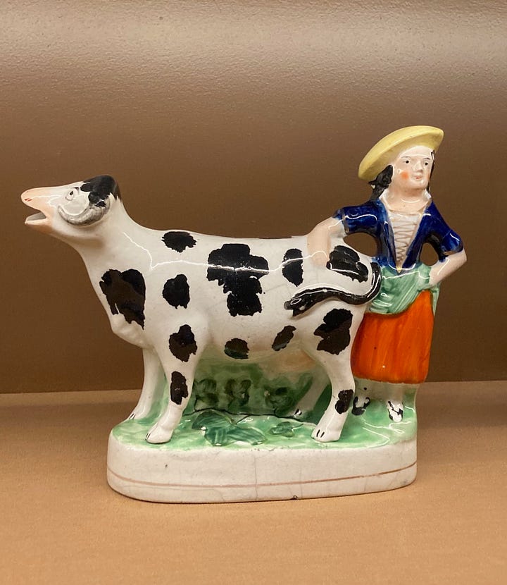 Four images of ceramic cow creamers, made late 18th centruy to early 19th century, and image of shelves holding several jugs 