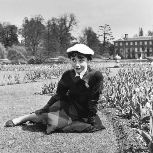 Marilyn Monroe and Audrey Hepburn wearing a beret