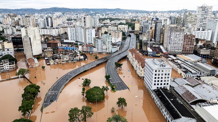 A drone view shows a flooded city center after people were evacuated in Porto Alegre, in Rio Grande do Sul state, Brazil, May 5. Photo: Renan Mattos/Reuters. A drone view shows vehicles in the area affected by the floods, in Encantado, Rio Grande do Sul state, Brazil, May 3. Photo: Diego Vara/Reuters.