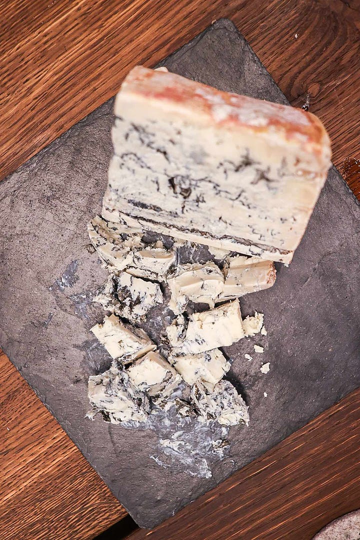 Genussbunker's funky blue cheese and Pallone di Gravina cheese as part of their tasting room sampling session