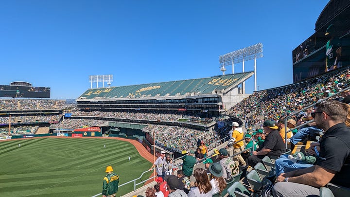 Fans crowd BART, the pedestrian walk way, and the Coliseum itself