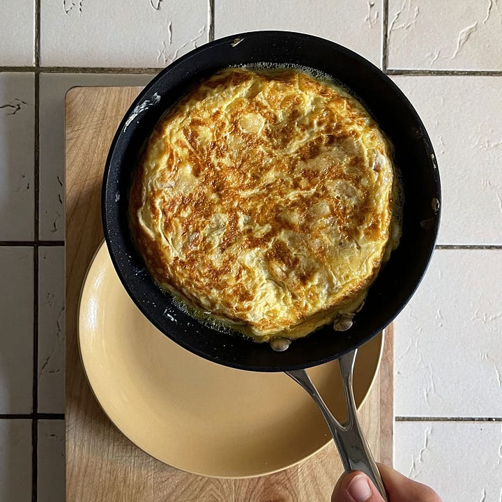 Bluebird crisps, spanish omelette, aioli, partly eaten omelette.