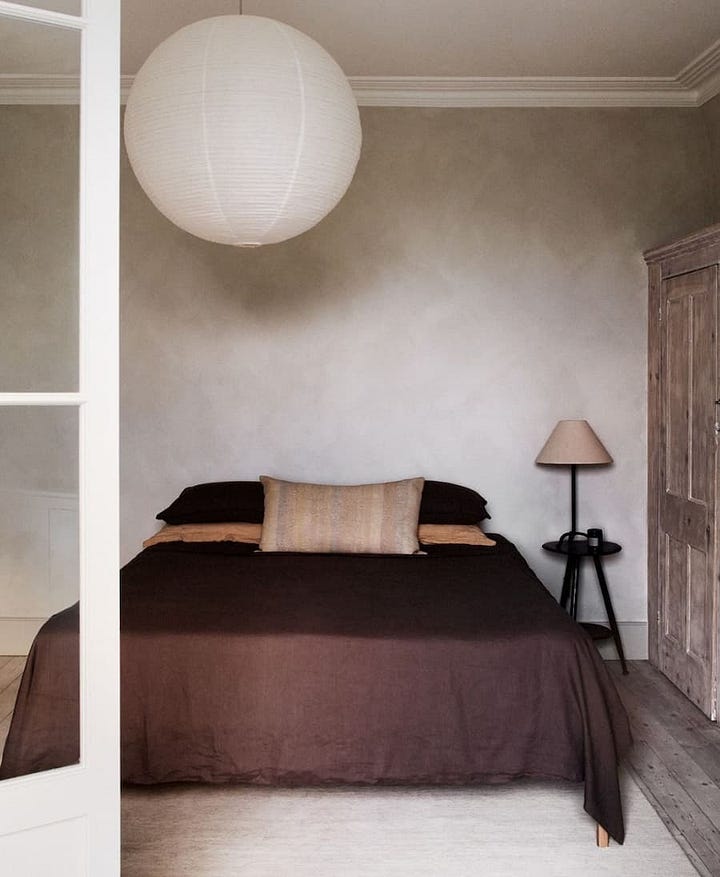 bedrooms using warm plumy tones alongside neutral highlights