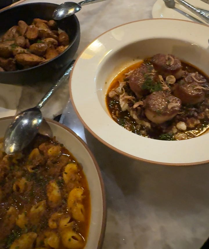 scallops lamb ragu flan at custom shop charlotte