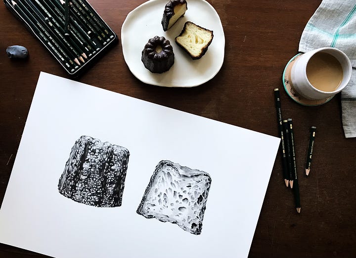 A image of the work in progress when the pencil drawing isn't quite finished, and an image of the finished drawing on a surface with pencils around it and an actual canelé on a plate above it. 