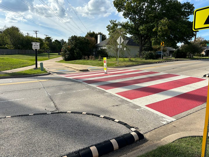 Northhaven trail sign and pedestrianized intersection.