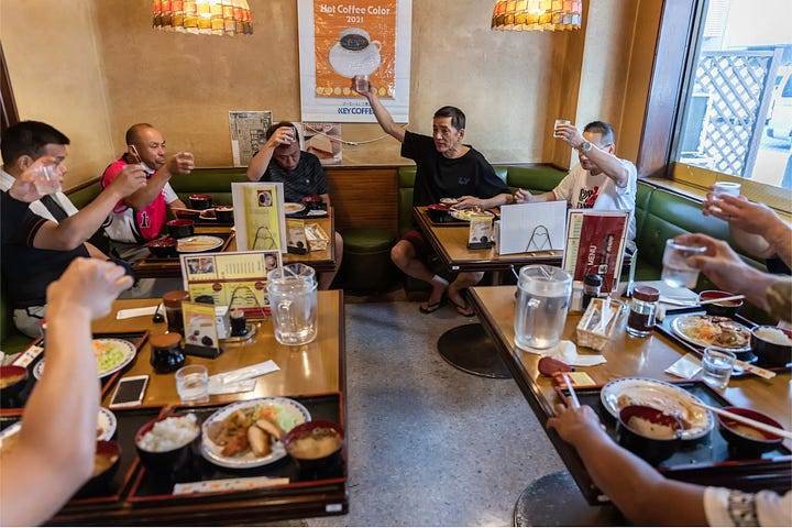 Images from a New York Times profile of an amateur softball team made of former Yakuza members.