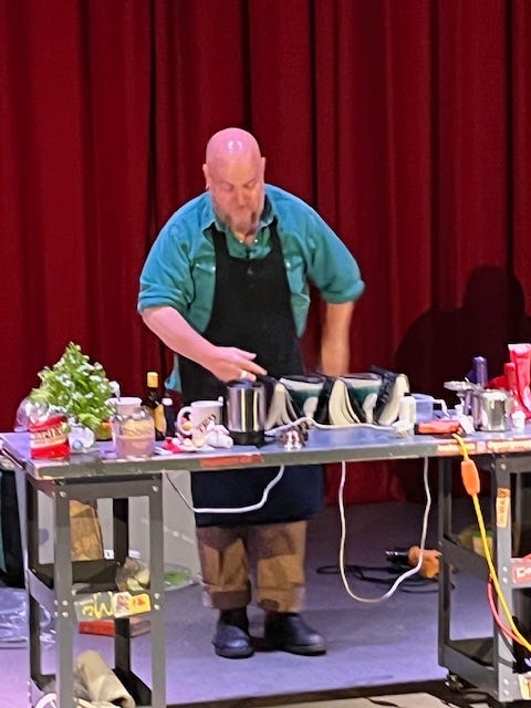 Several images of the comedy chef George Egg on stage in front of a red curtain and behind a table topped with ingredients and cooking tools