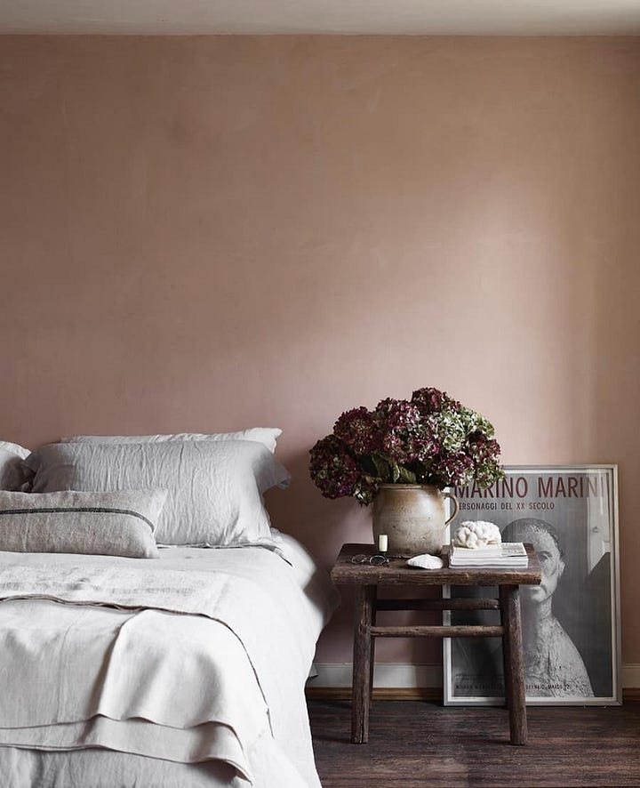 bedrooms using warm plumy tones alongside neutral highlights