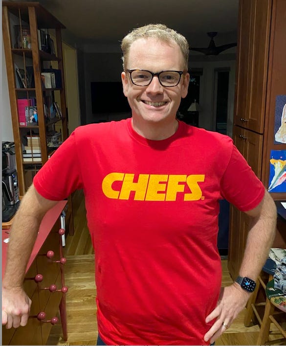 On the left, a picture of the author — a 40-something white man with, in the right light, still-reddish hair. wearing a bright-red t-shirt with the word "CHEFS" stamped across it in golden yellow letters, evoking the Chiefs' logo. On the right, a 30-year-old sweatshirt that I wore in high school, with the cartoon heads of seven KC stars of that year, including Derrick Thomas, Neil Smith, Marcus Allen and ... well, Steve Bono. 