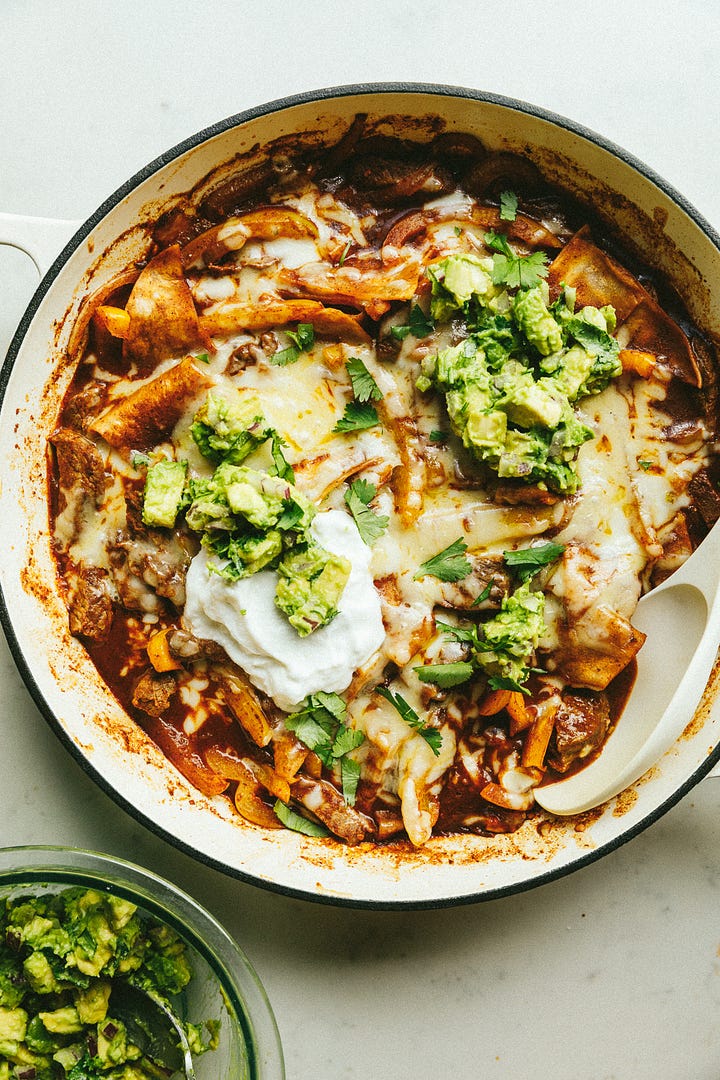 Steak fajita enchilada skillet with avocado salsa and Greek yogurt.