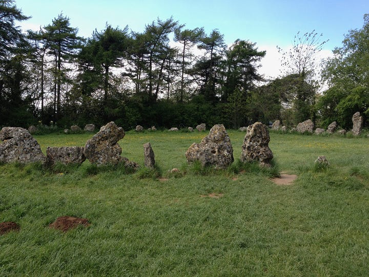 Prehistoric standing stones, one with view through a perfect circle carved through.