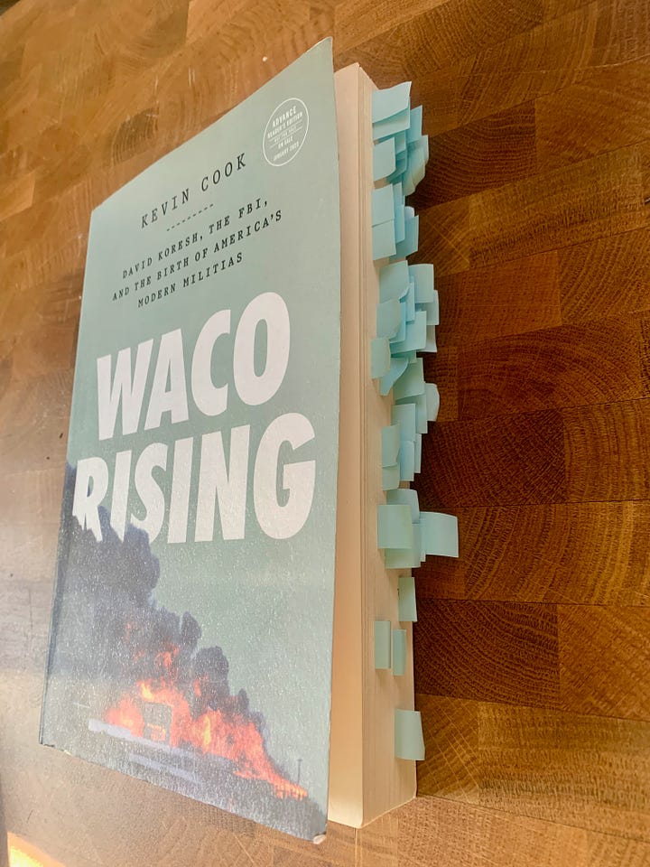 Photos of Waco Rising by Kevin Cook, thoroughly tabbed and with notes scrawled all over it