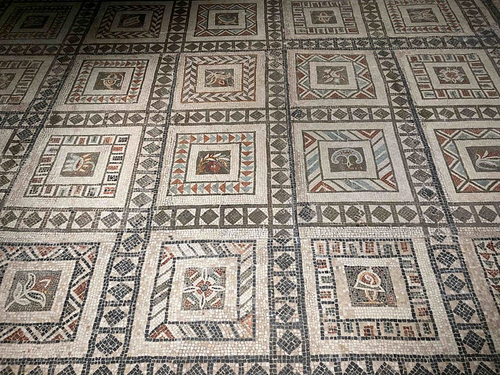 Two images of Roman mosaics, the first a close up of the pomegranate, the second showing the pomegranate and other parts of the mosaic