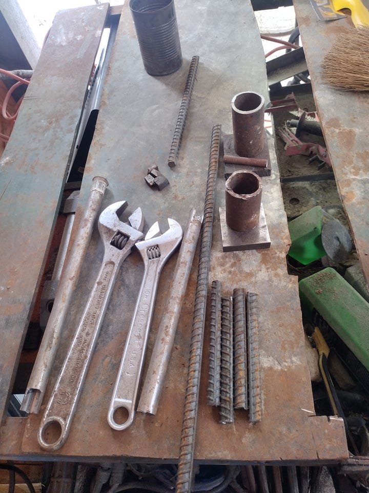 An assortment of rebar, spring sections, and other bits of scrap metal