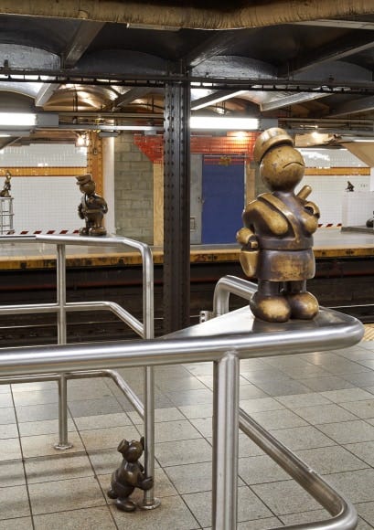 4 photos of "Life Underground" in the NYC subway, by Tom Otterness