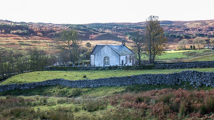 Croick Church in the landscape. A close-up of a church window with the reflection in it.