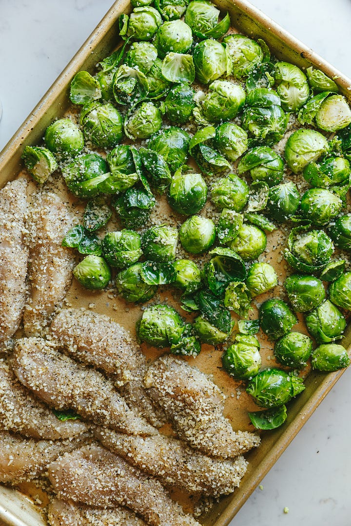 Seasoning mix for chicken parmesan tenders and everything on a sheet pan.