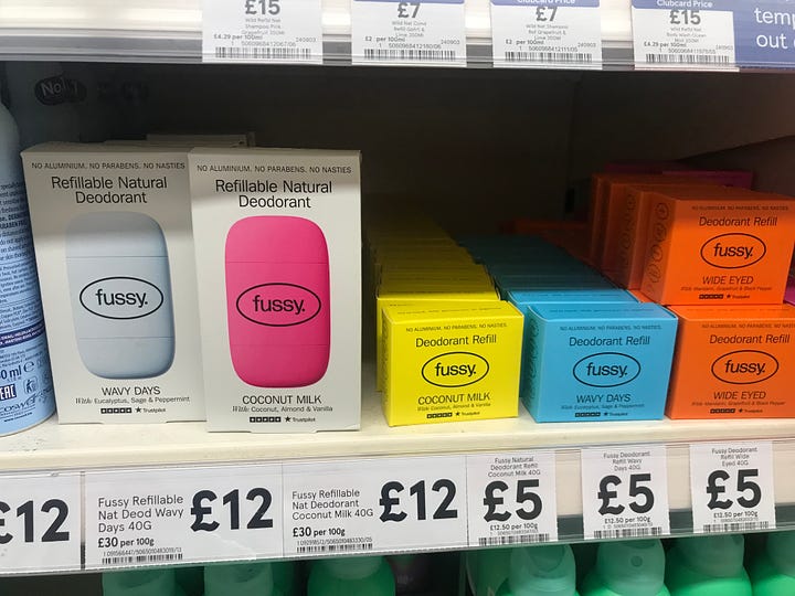 Bright images of refillable deodorant, packaging details promoting long lasting aluminium re-usable deodorant cases and wooden clothes pegs on sale; all images from local store shelves