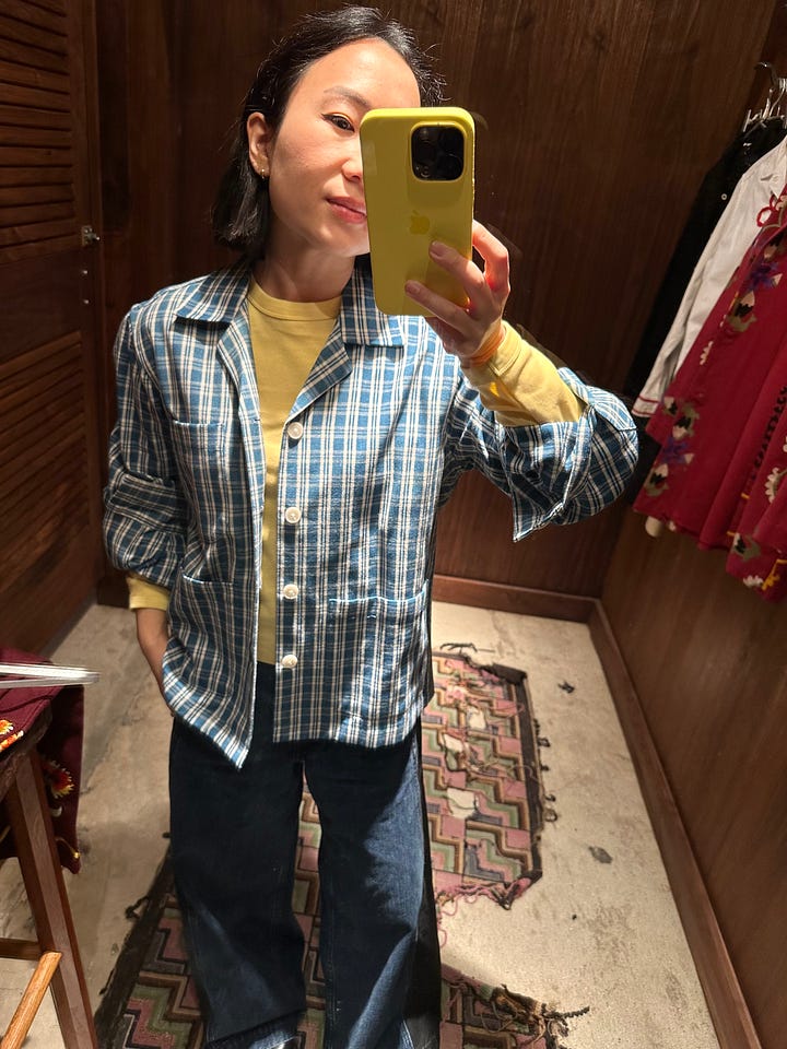 Styling my basic yellow tee with a statement pant and under a plaid one of a kind button down shirt at Bode.