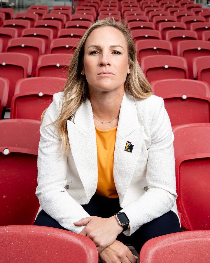 Amy Rodriguez poses for photos at America First Field upon being introduced as the new head coach of the relaunched Utah Royals FC. (Photo: Laura Dearden, Utah Royals FC)