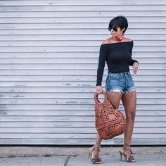 Images are of Kyrzayda Rodriguez in her street style with denim shorts and heels.