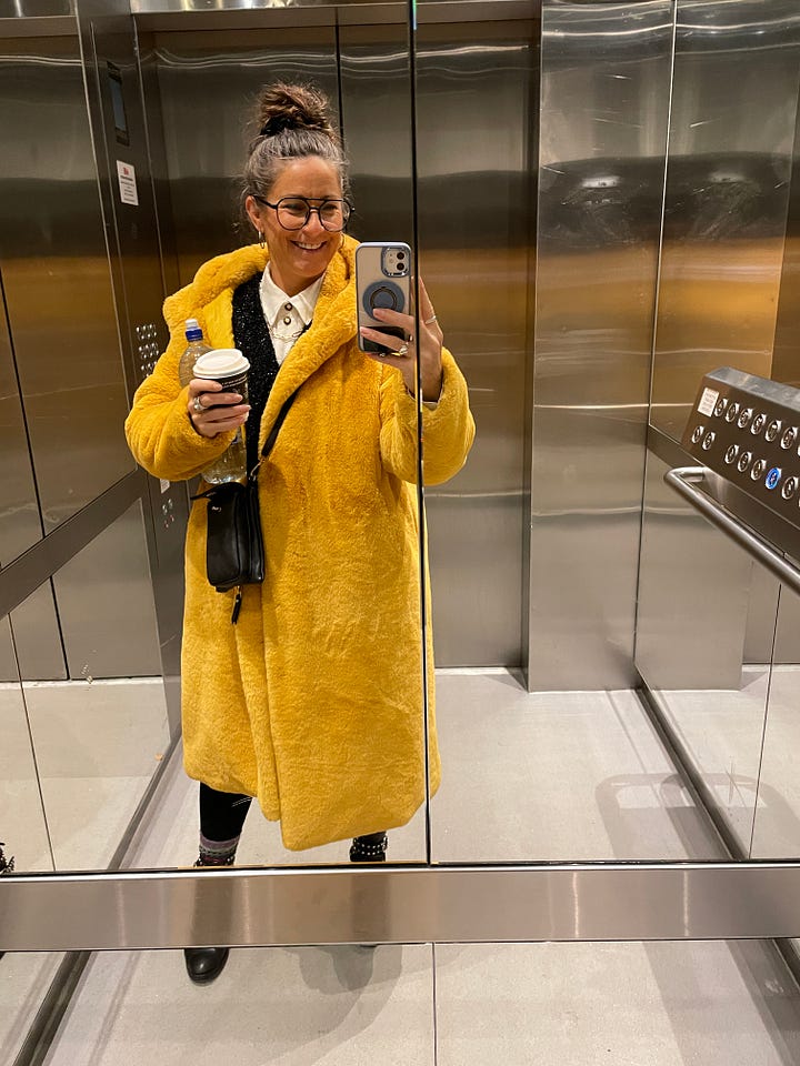 Yellow fake fur coat and a cavoodle