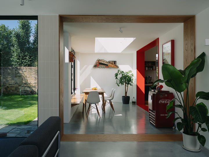 Colourful home, dining room, kitchen, open-plan interior, skylight, wood flooring, herringbone flooring