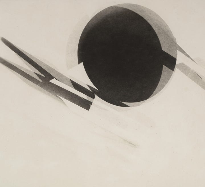 A gallery of four photos from Man Ray, László Moholy-Nagy, andDora Maar